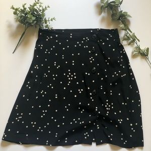Navy blue polka dotted skirt